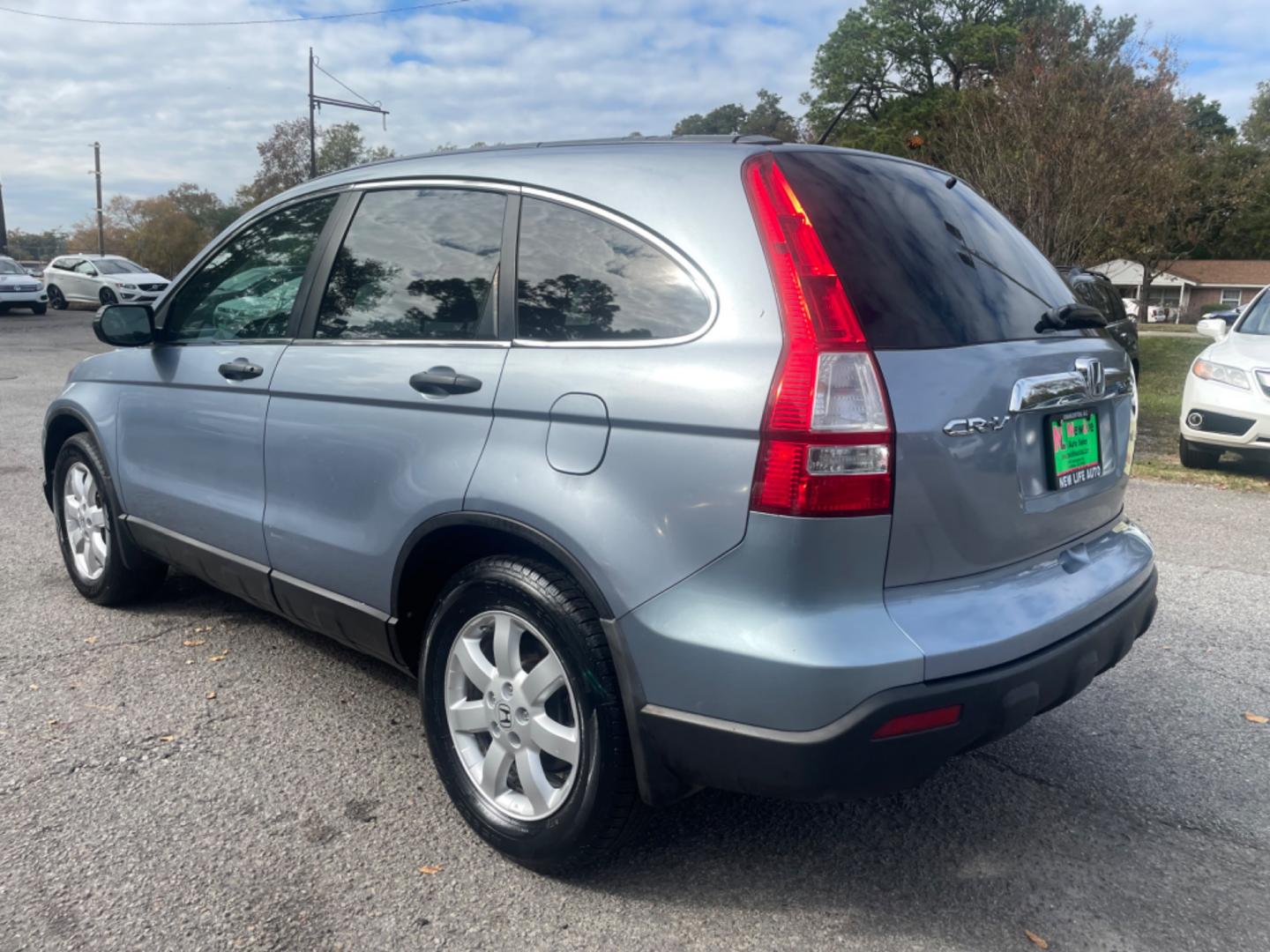 2007 BLUE HONDA CR-V EX (5J6RE48547L) with an 2.4L engine, Automatic transmission, located at 5103 Dorchester Rd., Charleston, SC, 29418-5607, (843) 767-1122, 36.245171, -115.228050 - Sunroof, 6-Disc CD Changer/AUX Power Windows, Power Locks, Power Mirrors, Keyless Entry, Alloy Wheels. 160k miles Located at New Life Auto Sales! 2023 WINNER for Post & Courier's Charleston's Choice Pre-owned Car Dealer AND 2018-2024 Top 5 Finalist for Charleston City Paper's BEST PLACE TO BUY A US - Photo#4